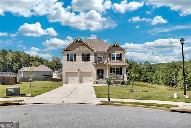 craftsman-style house with a garage and a front lawn