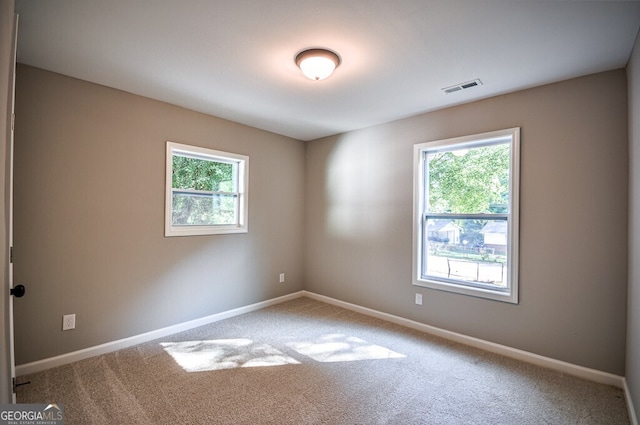 view of carpeted spare room