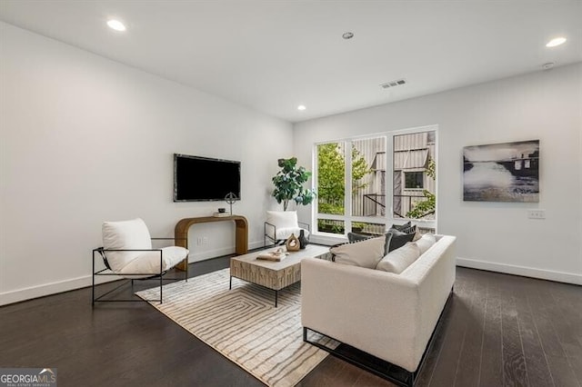 living room with dark wood-type flooring