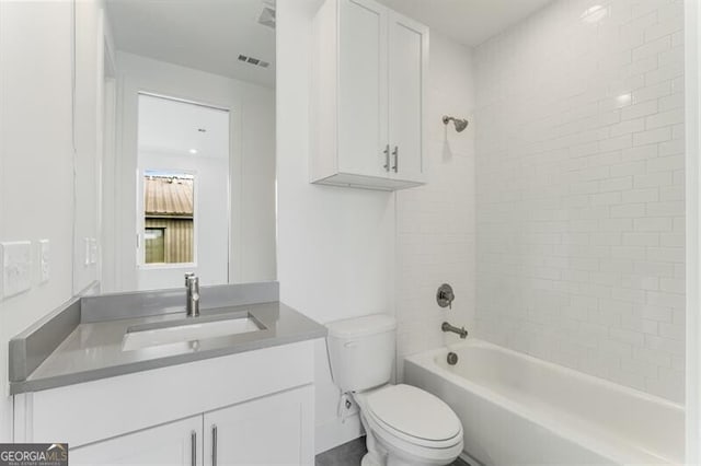 full bathroom featuring vanity, toilet, and shower / bathtub combination