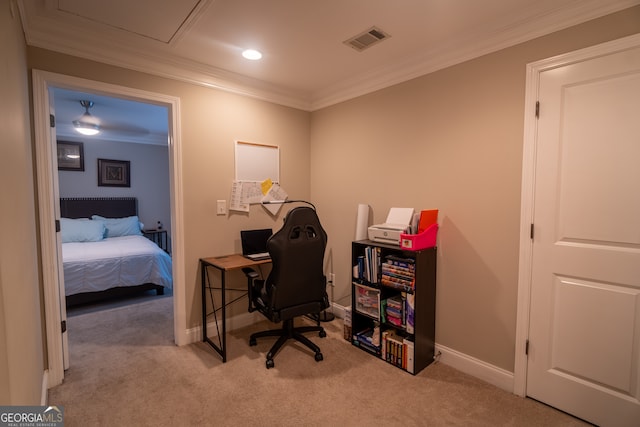 office area featuring light carpet and crown molding