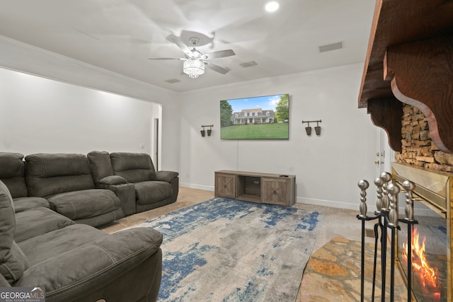 carpeted living room featuring crown molding and ceiling fan