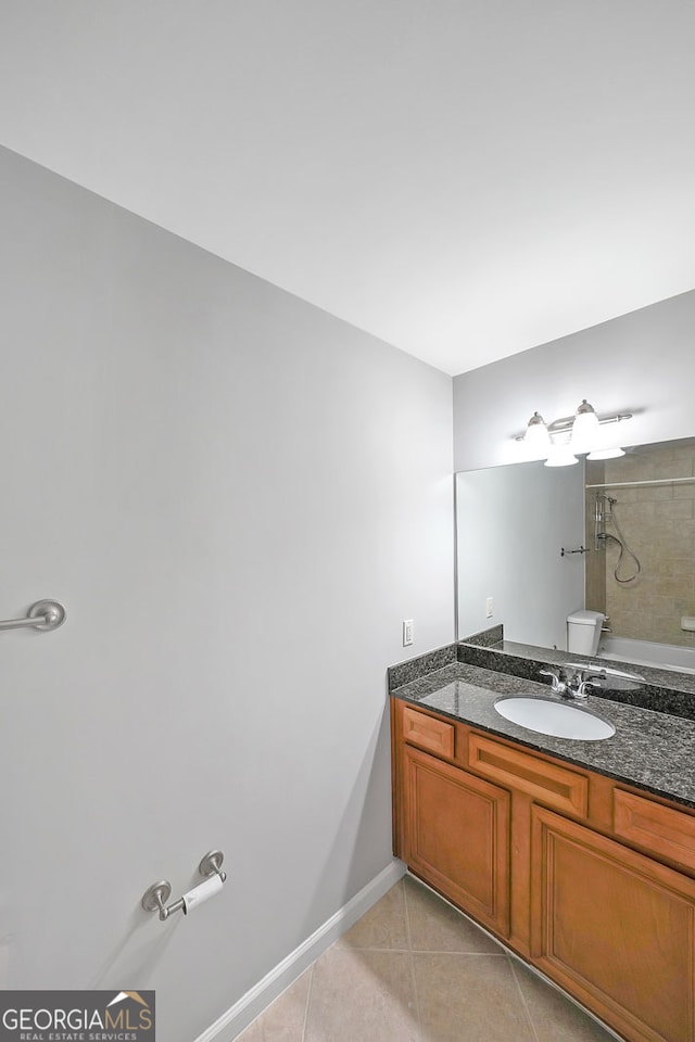 bathroom with vanity and tile patterned floors