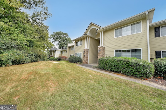 exterior space with a front yard