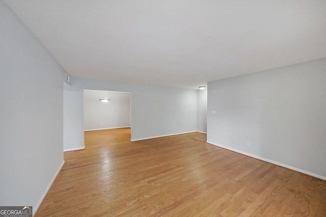 unfurnished room featuring light hardwood / wood-style flooring