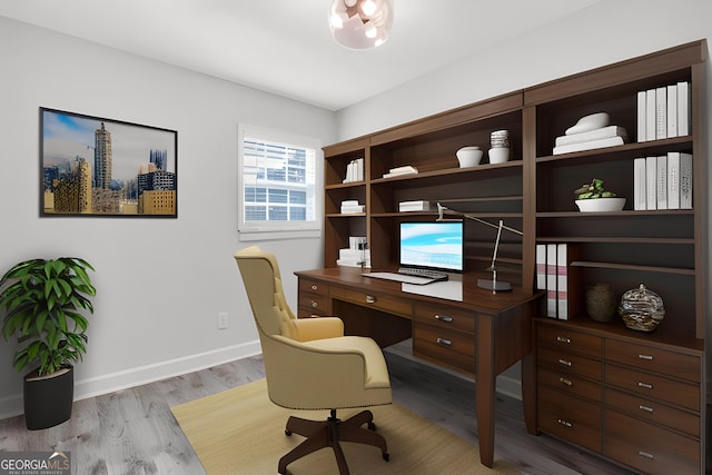 office space with light hardwood / wood-style floors