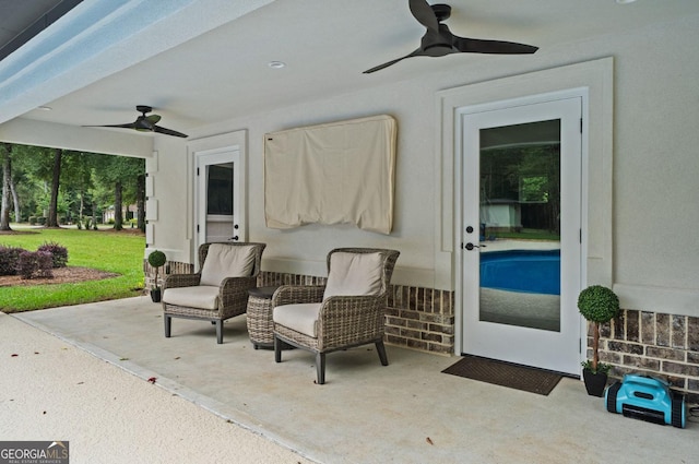 view of patio with ceiling fan