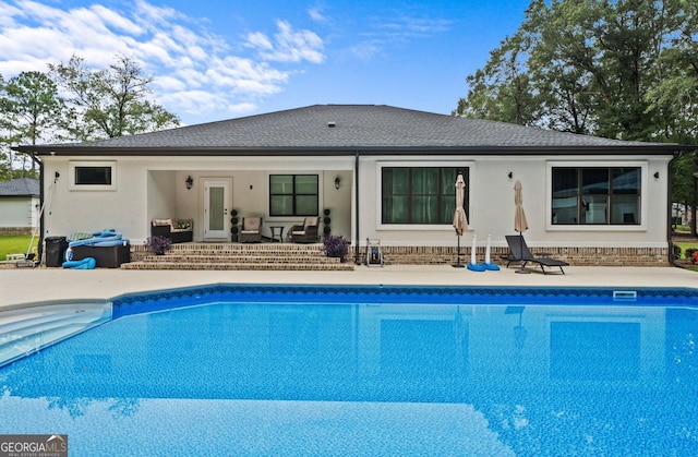 rear view of house with a patio area