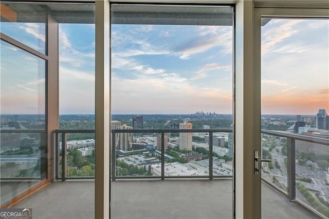 3630 Peachtree Rd Unit Ph3302, Atlanta, GA 30326 - balcony at dusk featuring a view of city