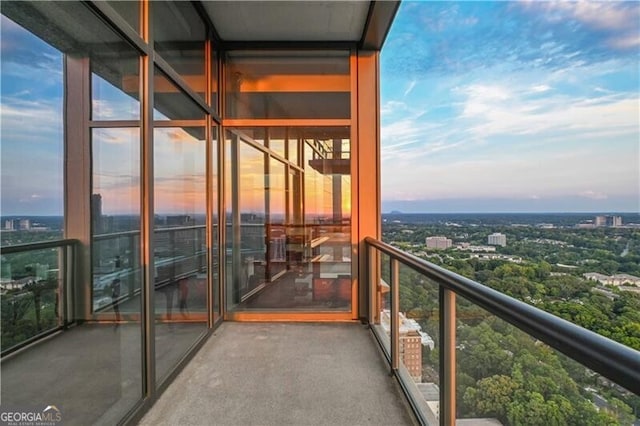 view of balcony at dusk