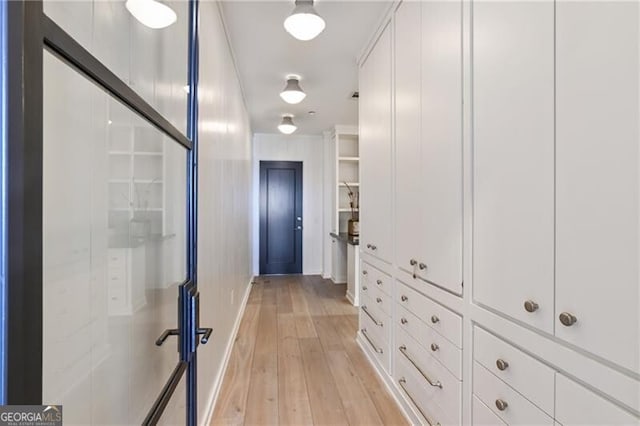 3630 Peachtree Rd Unit Ph3302, Atlanta, GA 30326 - hall featuring light wood-style flooring and baseboards
