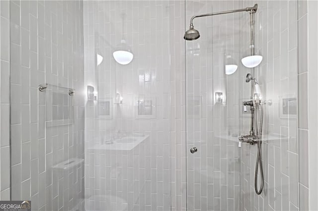 3630 Peachtree Rd Unit Ph3302, Atlanta, GA 30326 - bathroom featuring a tile shower