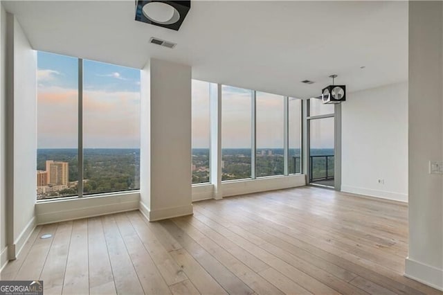 3630 Peachtree Rd Unit Ph3302, Atlanta, GA 30326 - unfurnished sunroom featuring plenty of natural light and a chandelier