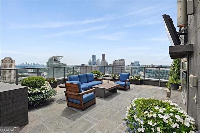 3630 Peachtree Rd Unit Ph3302, Atlanta, GA 30326 - view of patio with a skyline view and an outdoor living space