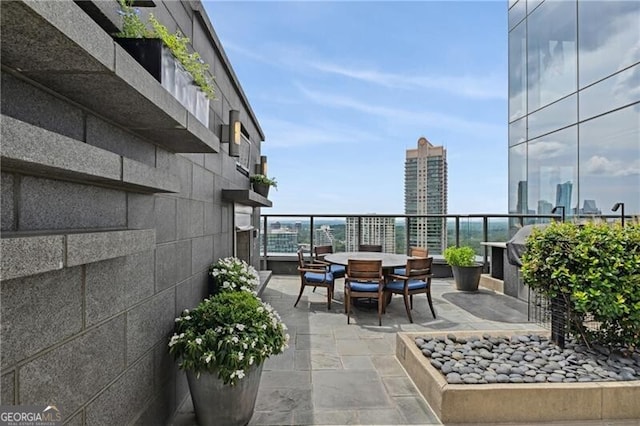 view of patio / terrace with a balcony