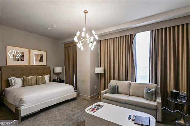 3630 Peachtree Rd Unit Ph3302, Atlanta, GA 30326 - bedroom featuring dark colored carpet, a chandelier, and baseboards