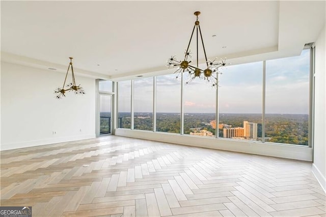 unfurnished sunroom with a notable chandelier