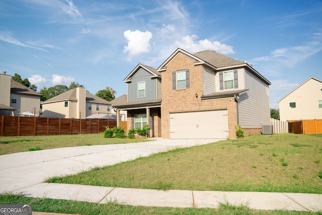 craftsman-style house featuring a garage, central AC unit, and a front yard