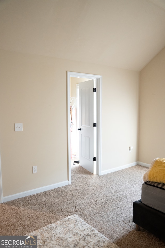 unfurnished room with carpet floors