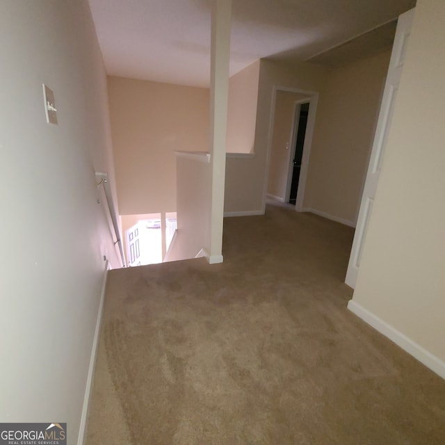 hallway featuring carpet flooring