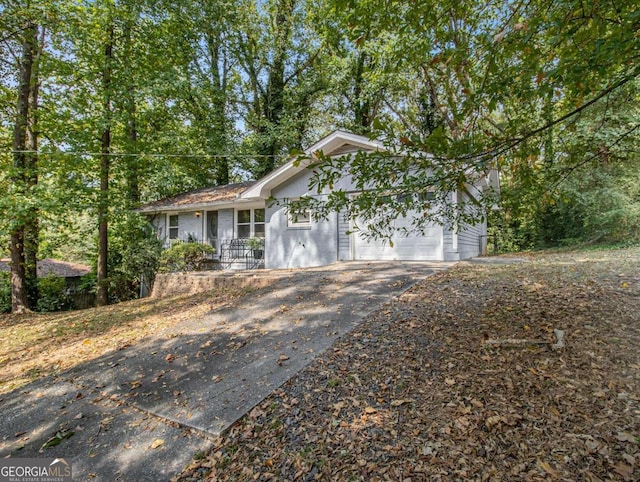 ranch-style house featuring a garage