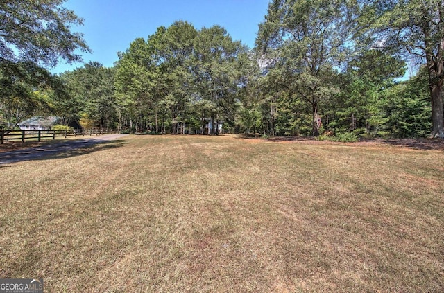 view of yard with fence