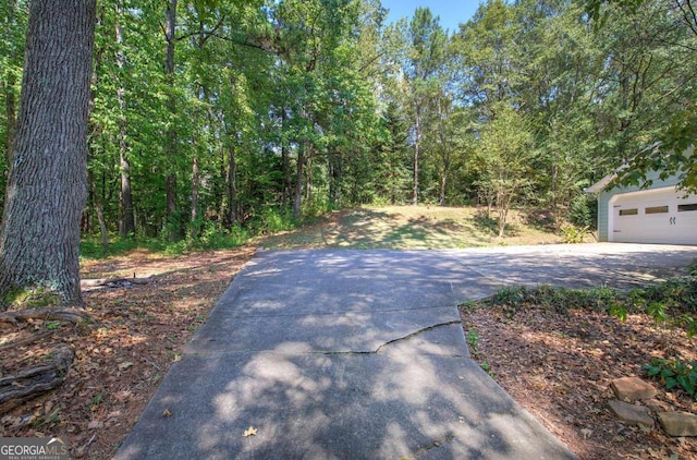 view of road with driveway