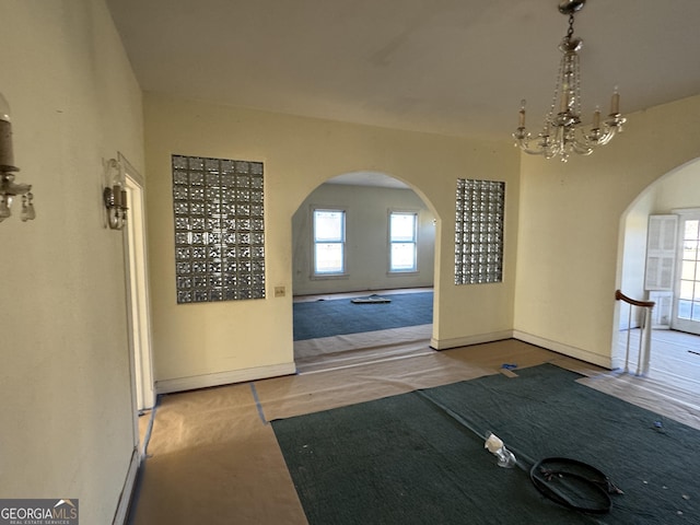 interior space with a notable chandelier