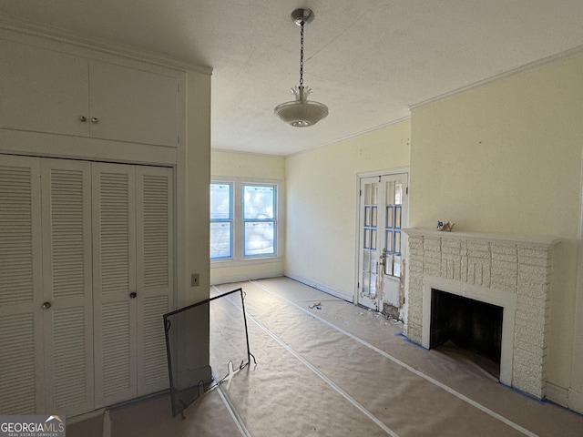 unfurnished living room featuring a brick fireplace and ornamental molding