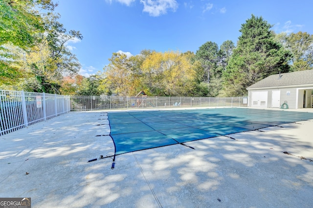 view of pool featuring a patio area