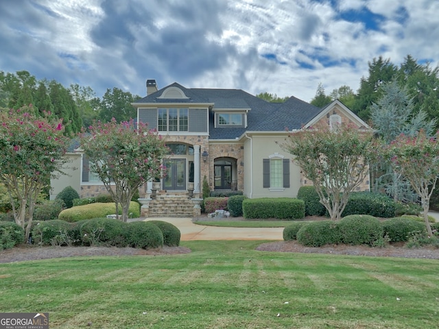 view of front of home featuring a front lawn