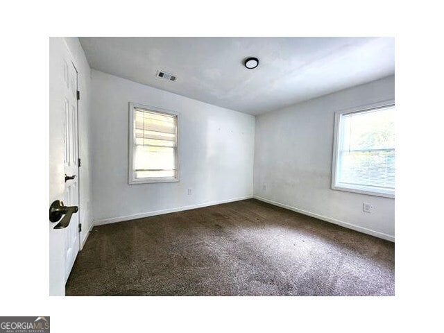 view of carpeted spare room