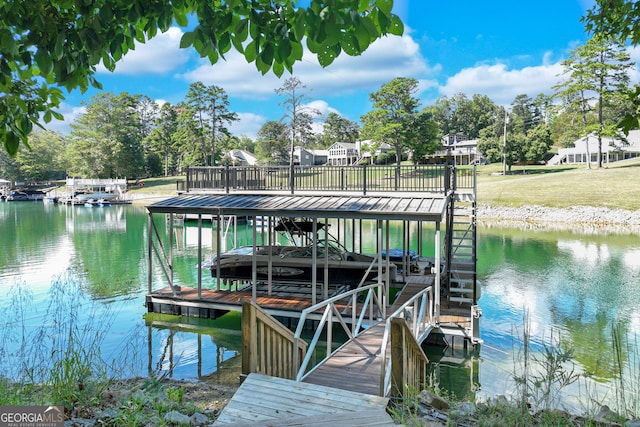 dock area with a water view