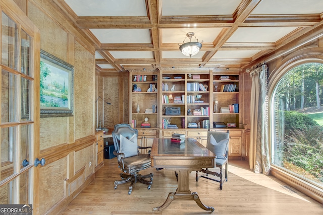 office featuring beamed ceiling, light wood-type flooring, and coffered ceiling