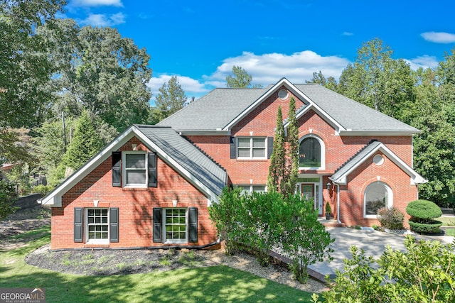 view of front property with a front lawn