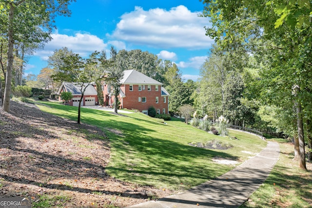 view of yard featuring a garage