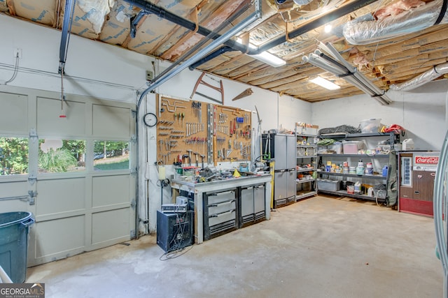 garage with a workshop area