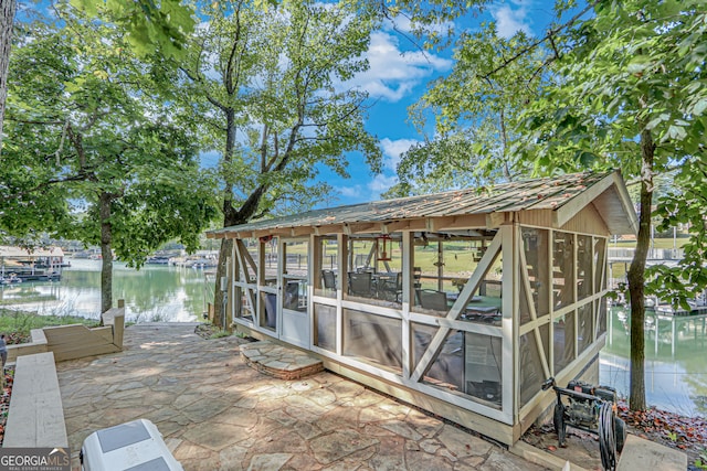 dock area with a water view