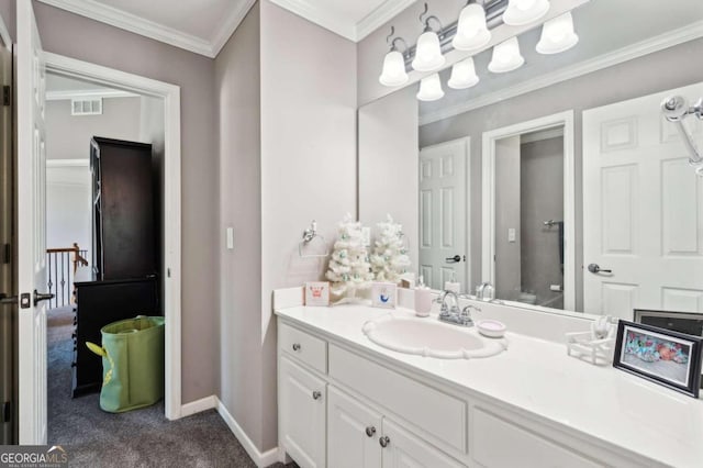 bathroom featuring vanity and crown molding