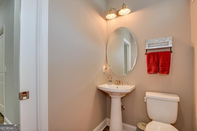 1370 Deerwood Cir, Stapleton, GA 30823 - bathroom with toilet and baseboards