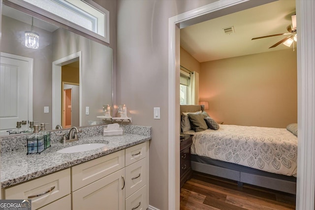 1370 Deerwood Cir, Stapleton, GA 30823 - bedroom featuring a sink and wood finished floors