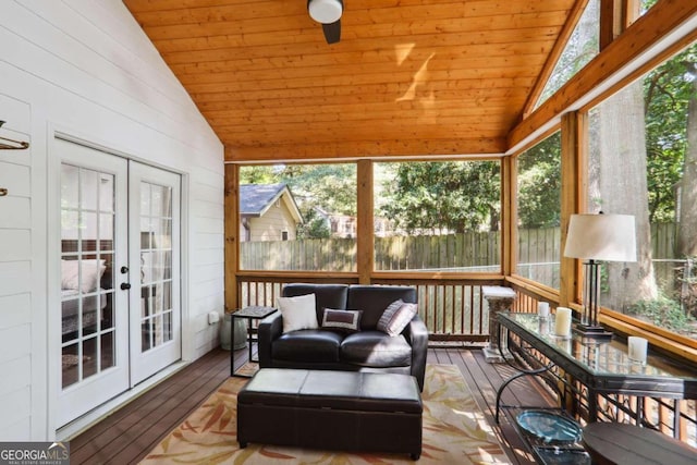 sunroom featuring wood ceiling, vaulted ceiling, a healthy amount of sunlight, and french doors