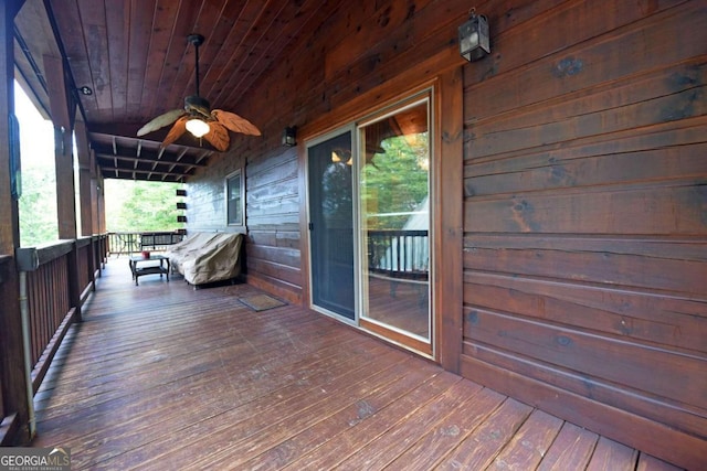 wooden terrace with ceiling fan