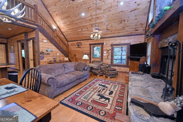 living room with wooden ceiling, wooden walls, high vaulted ceiling, and hardwood / wood-style flooring