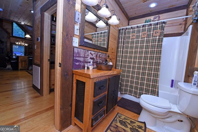 full bathroom with wood ceiling, lofted ceiling, hardwood / wood-style flooring, shower / bathtub combination with curtain, and toilet