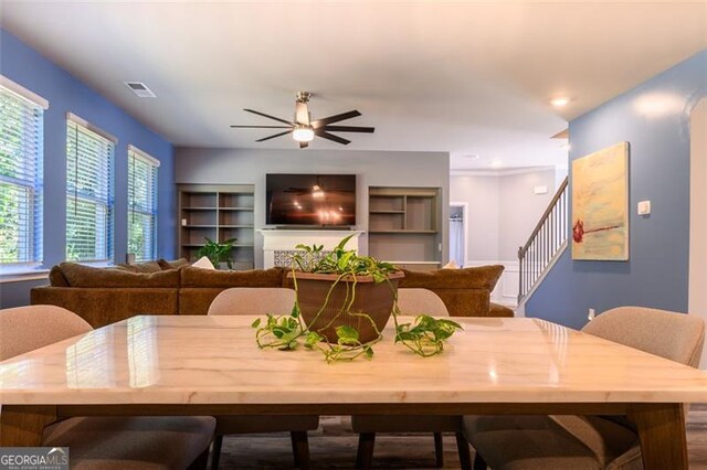 dining room featuring ceiling fan