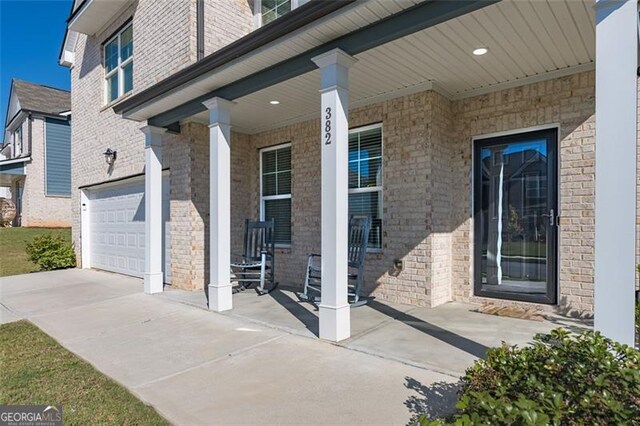 entrance to property with covered porch