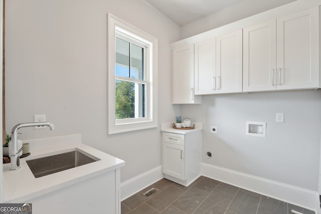 laundry room with washer hookup, cabinets, sink, and hookup for an electric dryer