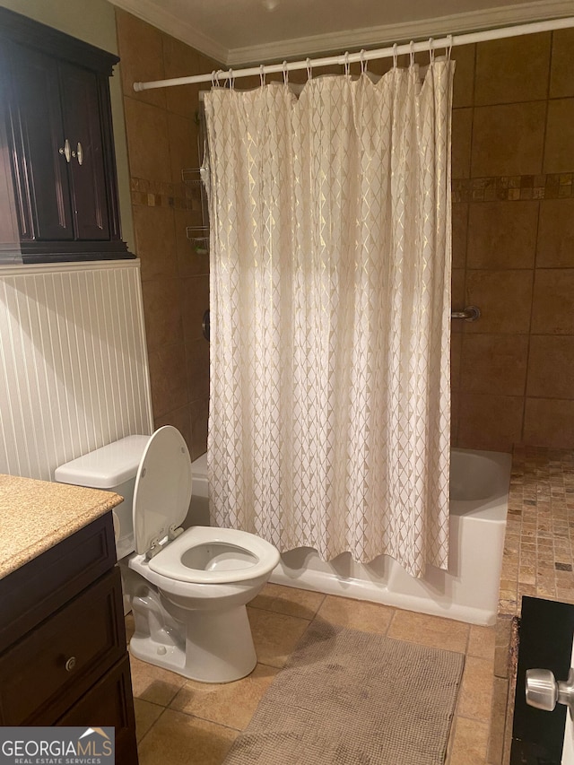 full bathroom with vanity, shower / tub combo with curtain, crown molding, tile patterned flooring, and toilet