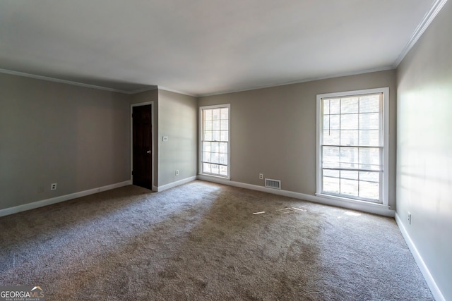 carpeted empty room with ornamental molding